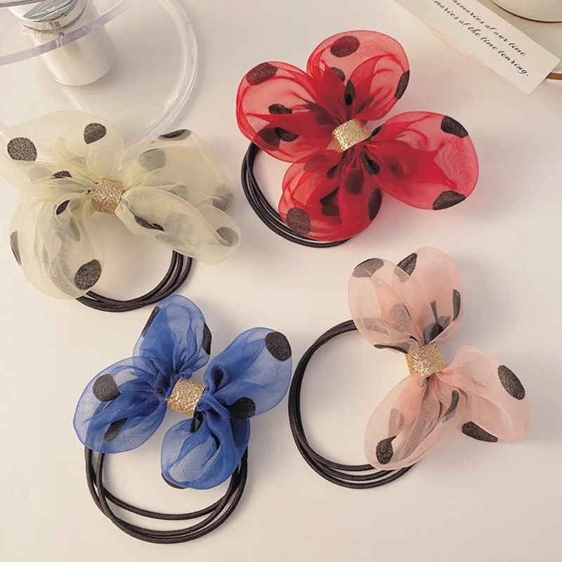 

[Xwen] Simple net wave point butterfly knot hair rope hair accessories Korean leather cover female head rope tie hair band