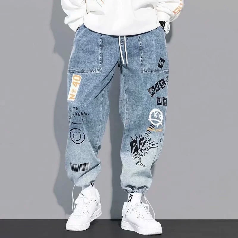 цена ICCLEK Autumn New Letter Printed Jeans Men's Tide Brand Loose Cartoon Graffiti Drawstring Pants Drawstring Pants Men Jeans