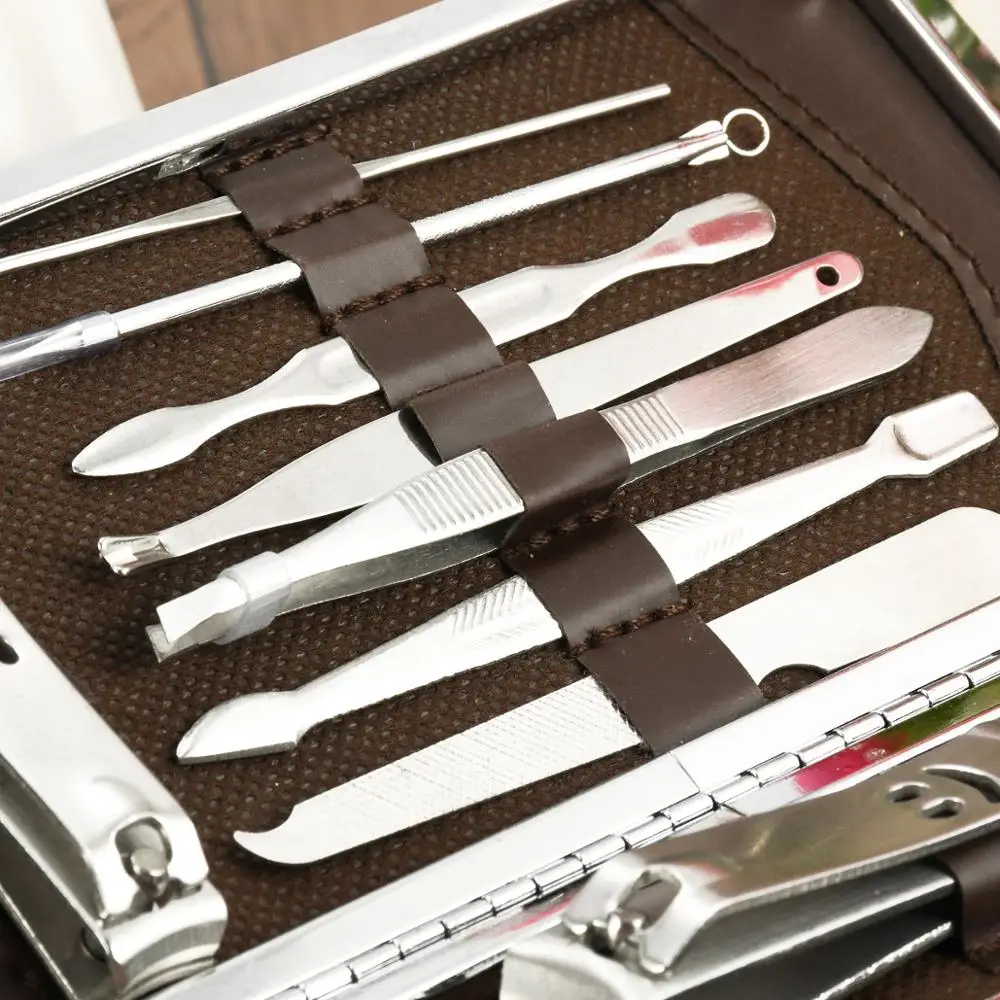 Günstige 12 teile satz Nail art Maniküre Werkzeuge Set Maniküre Sets Stein Muster Fall Für Nagel Maniküre Nägel Clipper Schere Pinzette Messer