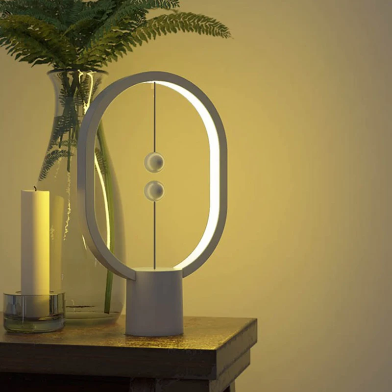 

USB Powered Ellipse Magnetic Mid-air Switch Night Light Mini Heng Balance LED Table Lamp Office Home Decoration Night Light