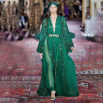 

New American wind shows lace stitching sexy dress deep V trumpet sleeve dress feather decoration perspective
