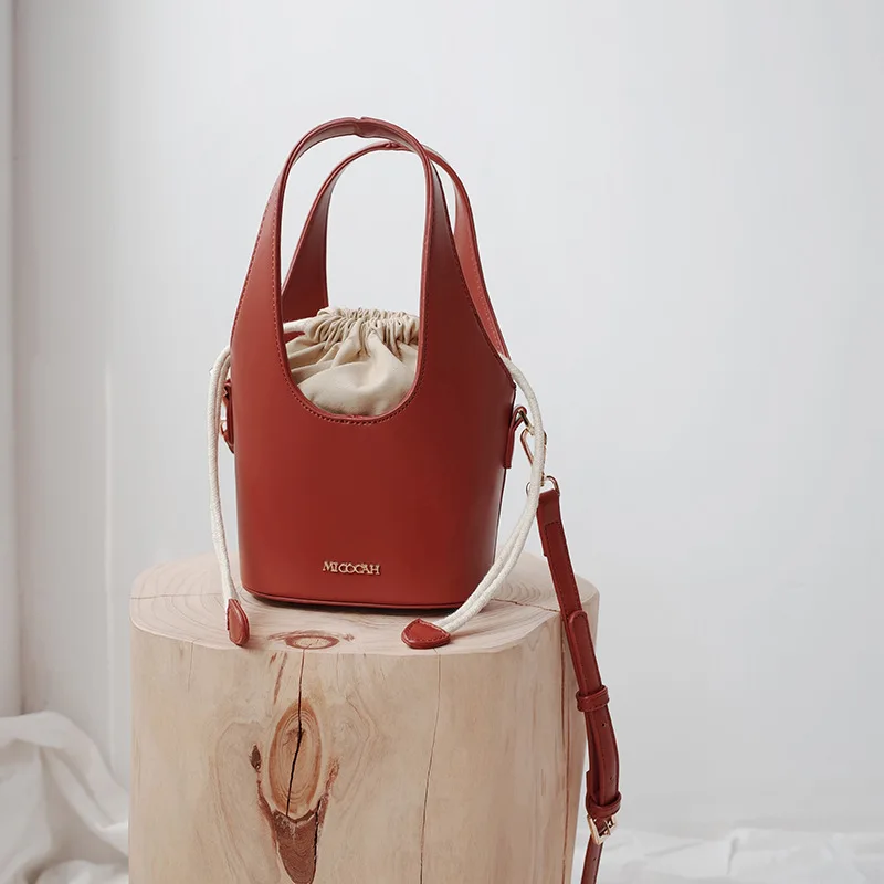 

New women's bag niche retro stereotypes drawstring portable bucket bag shoulder Messenger bag
