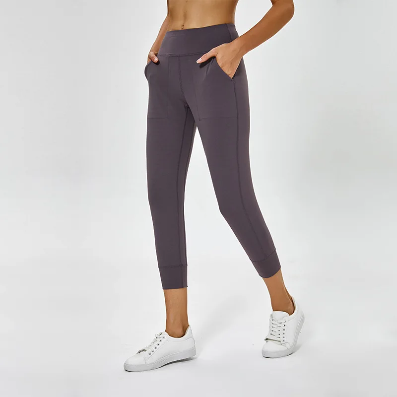 

Yoga Naked-feel Fabrics Loose Running Sport Capri Pants Women Thin Styles Jogger Training Capri Pants with Two Side Pocket