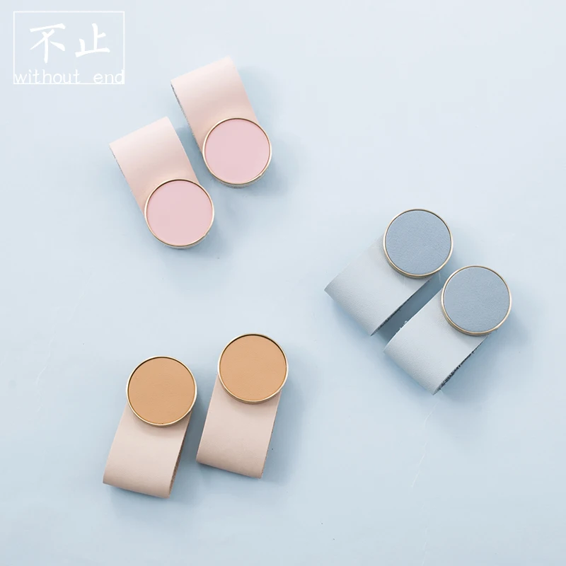 

Original Design Nordic Macarone Brass Leather Handle Top Layer Cowhide Tatami Anti Collision Door Handle for Children's Room
