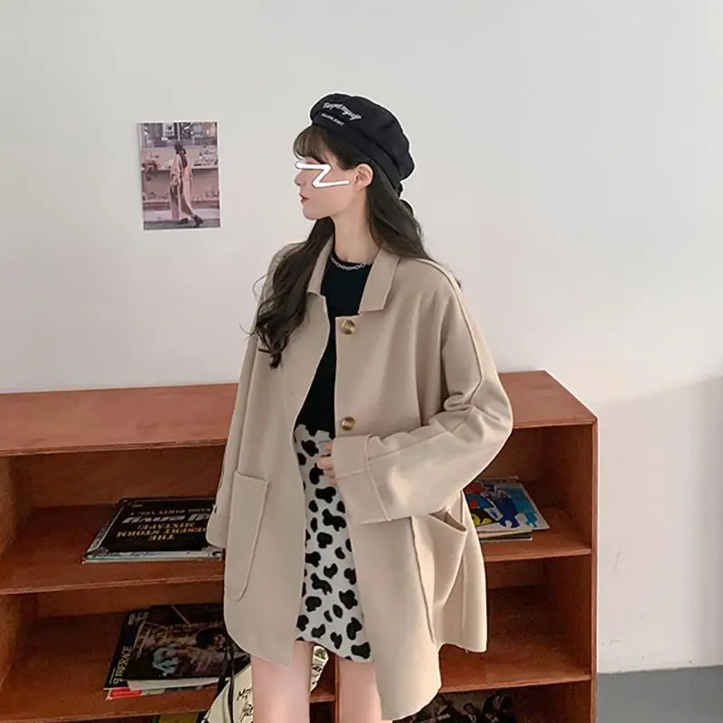 

Autumn and Winter Korean version 2020 New loose mid-length drape sense temperament long-sleeved woolen coat female student coat