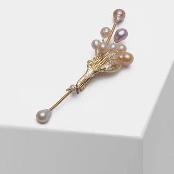 

Amorita Bouquet styling design fashion natural pearl brooch