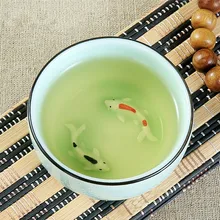 80 мл Celadon Китай чайная чашка ручная роспись тисненые рыбы чашки Цзиндэчжэнь каолин керамика Пуэр чайная чашка оптом
