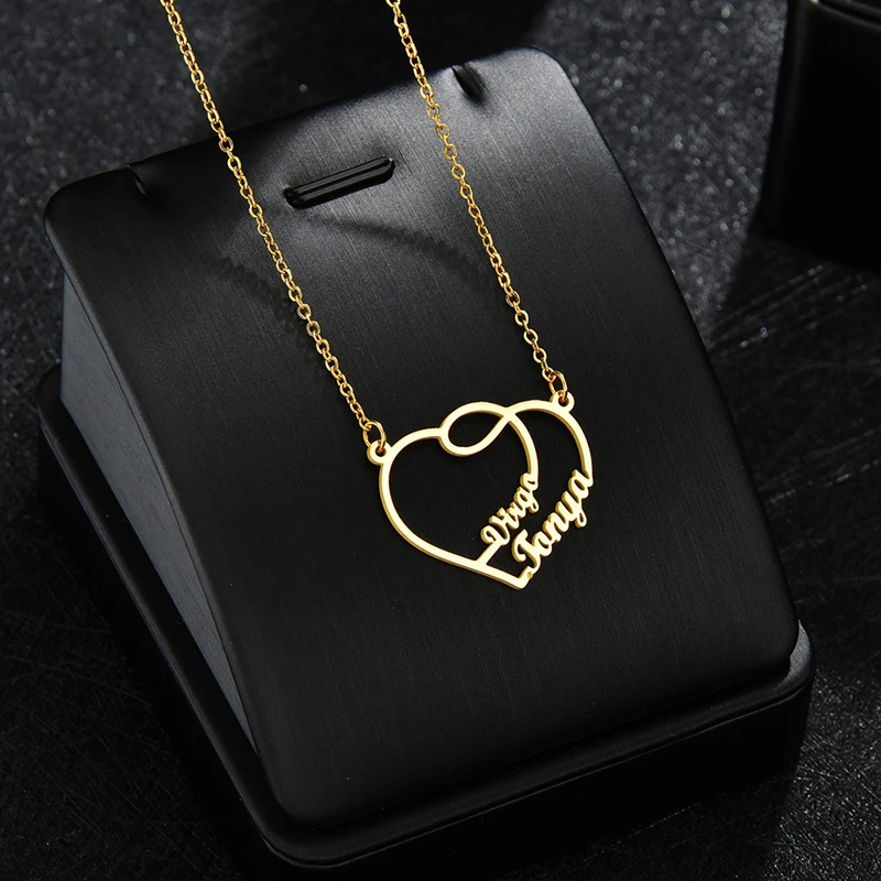 Collana con ciondolo a forma di cuore a forma di farfalla • Ciondolo