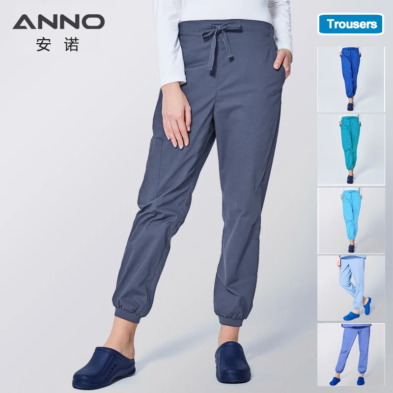Baratos ANNO trabajo pantalones de uniforme de médico, enfermera Bikini de algodón puños elásticos Dental matorrales médicos pantalones de enfermería para hombre mujer