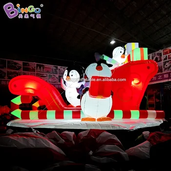 

5.5*5*4 meters inflatable lighting penguin ridding sled decoration with box personalized LED animal Christmas balloon PVC toy