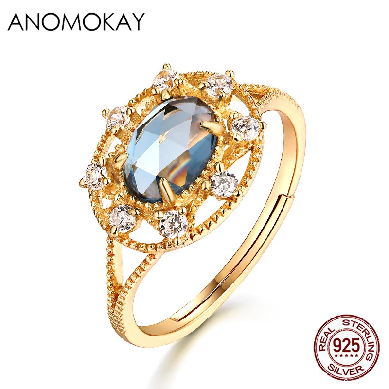 

Anomokay Oval Blue Topaz Gold Color Ring European American Trendy 925 Sterling Silver Retro Palace Resizable Ring for Women Gift