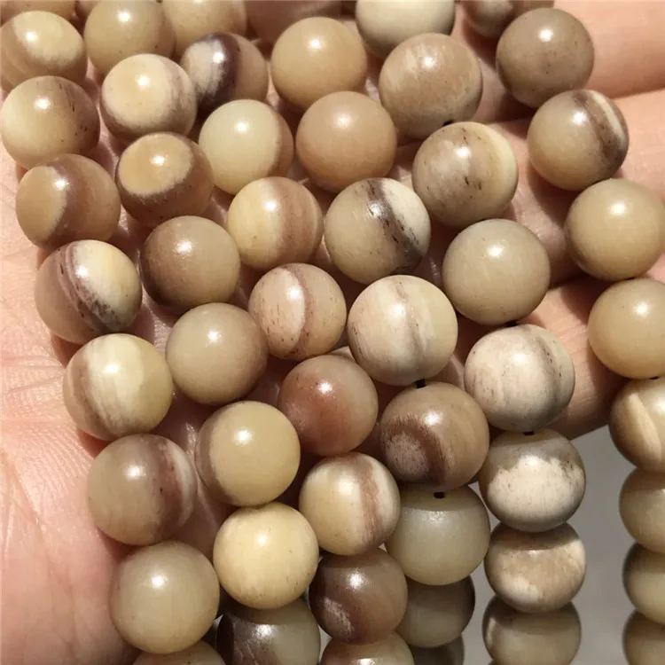 

Faux Big Cat Bone 8 Millimeter round Beads 108 Natural Blood Clear Tadpoles Pattern