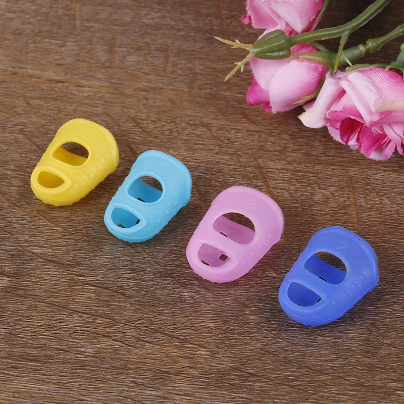 

4Pcs/Set Guitar String Finger Guard Fingertip Protector Silicone Left Hand Finger Protection Press Guitar Accessories