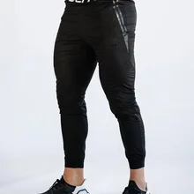 Новинка весны, мужские обтягивающие спортивные штаны, спортивные штаны для фитнеса, бодибилдинга, Мужские штаны для бега, тренировки, повседневные модные штаны, Брендовые брюки-карандаш