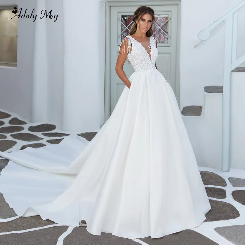 

Adoly Mey Sexy V-Neck Backless Satin Court Train A-Line Wedding Dress 2020 Luxury Beaded Appliques Princess Bride Gown Plus Size