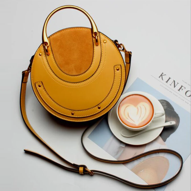 

Luufan Woman Stylish retro metal tote lady genuine leather lady purse round shap rivets tote bags young girls party bags mini