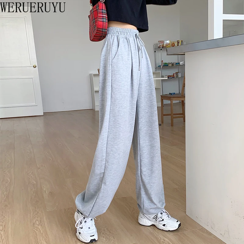 WERUERUYU pantalones casuales pantalones de las mujeres de primavera y novedad de verano de moda harén suelta de haz pies deportes salvaje era delgada de nueve puntos