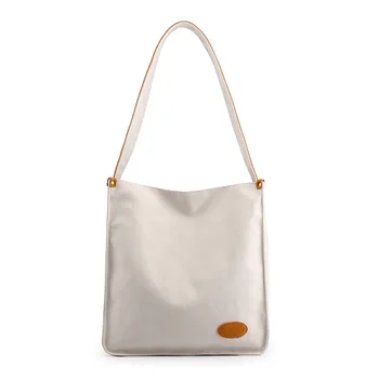 

Simple female bag new wave casual large capacity wild vertical section literary simple solid color shoulder bag Fashion Women