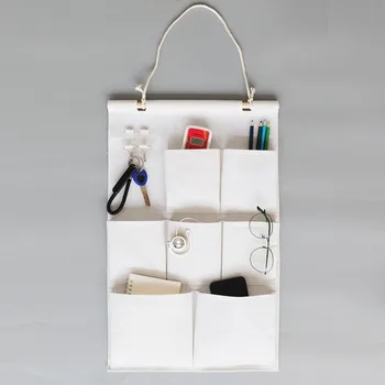

Simple and new Cotton and linen cloth storage bag primary color multi-purpose storage wall dormitory hanging debris storage bag