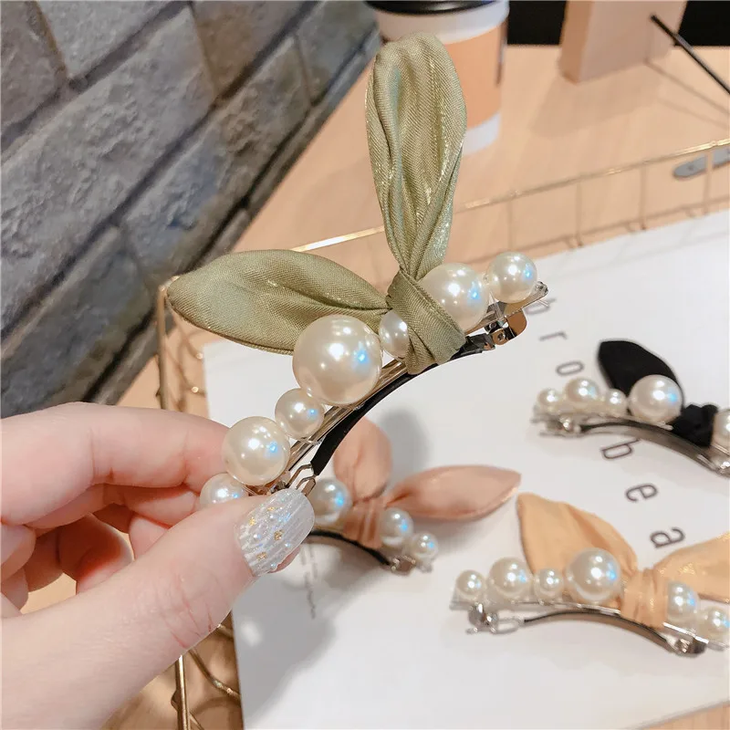 

New hand-woven pearl bow spring clip side clip student hair accessories
