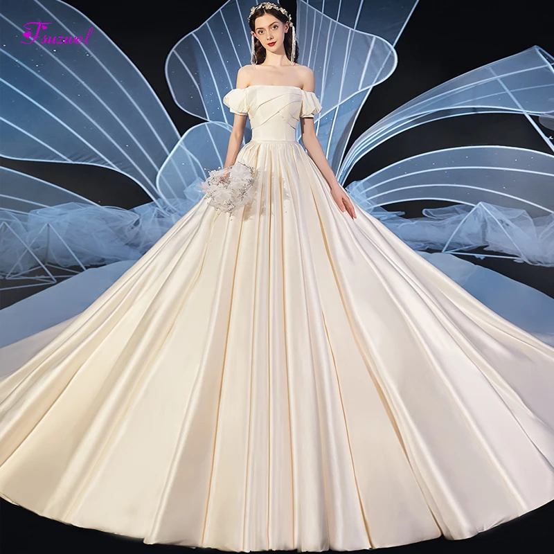 

Fsuzwel Gorgeous Chapel Train Satin A-Line Wedding Dresses 2020 Charming Boat Neck Lace Up Princess Bridal Gown Vestido de Noiva