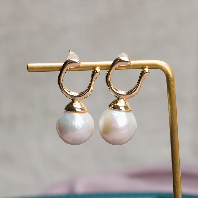 

Женские медные серьги-подвески с натуральным барочным жемчугом