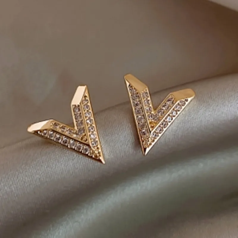 Luxury Brand Jewelry Simple Design V Letter Earrings for Women Stainless  Steel Gold-Color Elegant Party Stud Earrings - China Retro Earrings and  Hollow Earring price