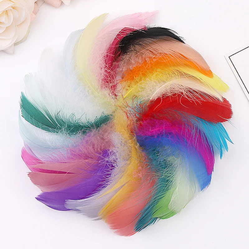 Description Picture 5 of item100pcs Natural Goose Feather 4-8cm Colorful Goose Down Feather Child Gift DIY Handmade Festival Stage Wedding Dress Decoration