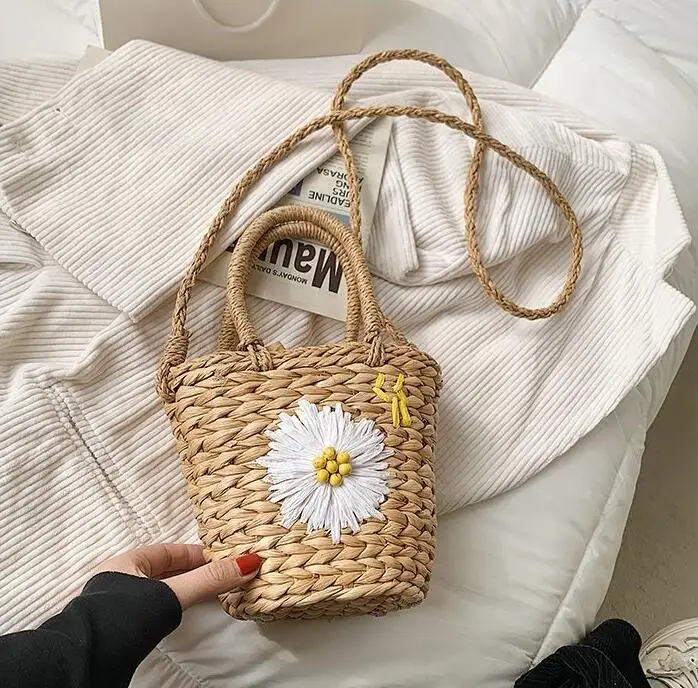 Woven Small Size Straw Tote Bag with Shoulder Strap and Flower Pattern.