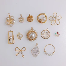 2 pieces / lot Fashion Exquisite Bow Rao Pentagram Crystal Pearl Real Gold Pendant Earring Earrings Accessories 2 pieces / lot Fashion Exquisite Bow Rao Pentagram Crystal Pearl Real Gold Pendant Earring Earrings Accessories