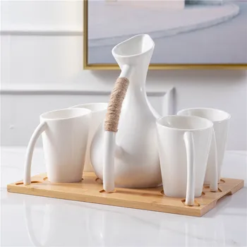 

Nordic one pot four cups large capacity ceramic cold kettle bone china classical water bottle with bamboo plate rural style
