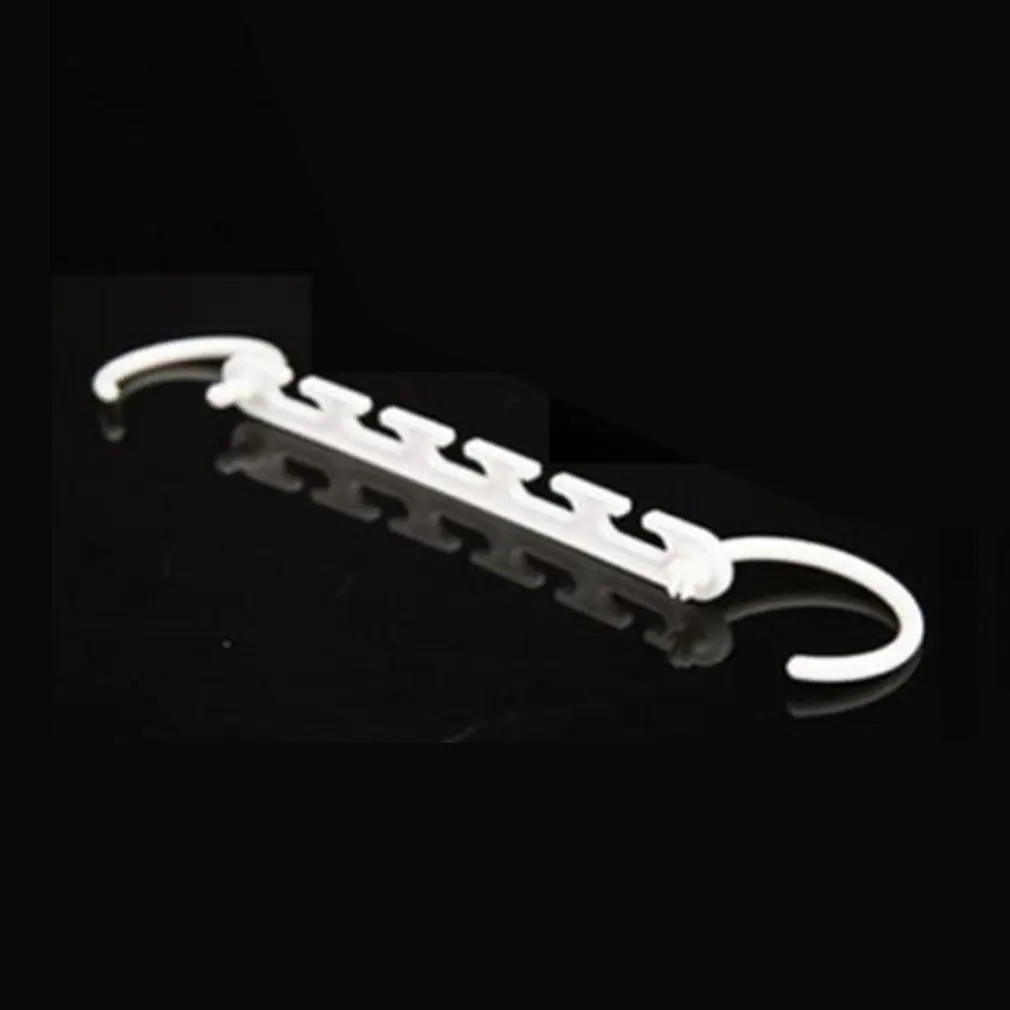 

Multi-function Five-hole Magic Magic Hanger