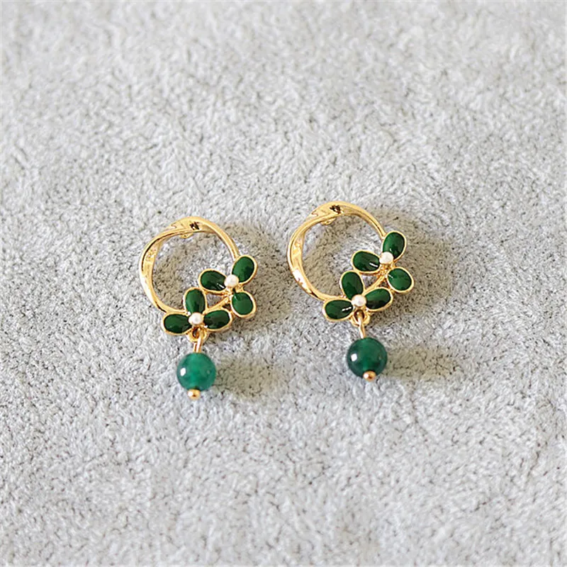 

Geometric design feeling colored glaze flower round pearl earrings women sweet temperament of Europe and the earrings