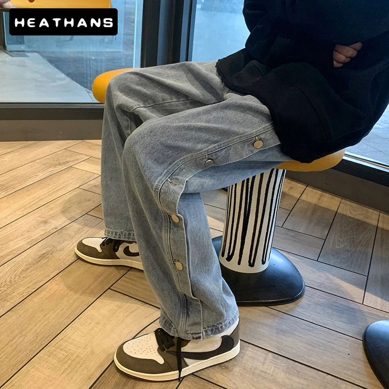 Doble botón en el lateral vaqueros ropa de calle de moda para hombre Casual pantalones de Hip Hop de pierna amplia Harajuku pantalones de carga