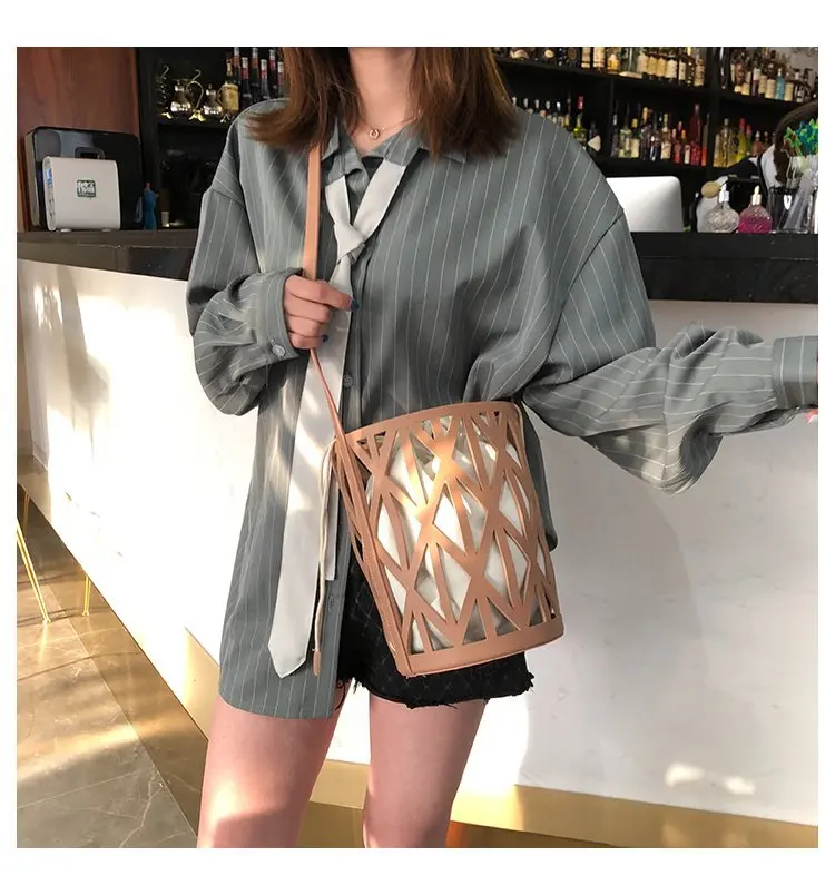 

Handbag high quality Korean version of the wild shoulder slung fashion hollow personality bucket bag 2019 new JIULIN