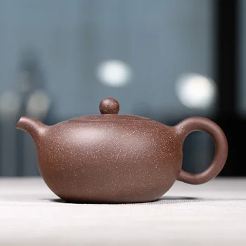 

Genuine Yixing original mine purple clay pot famous family pure handmade tea pot tea set purple gold sand flat rhyme