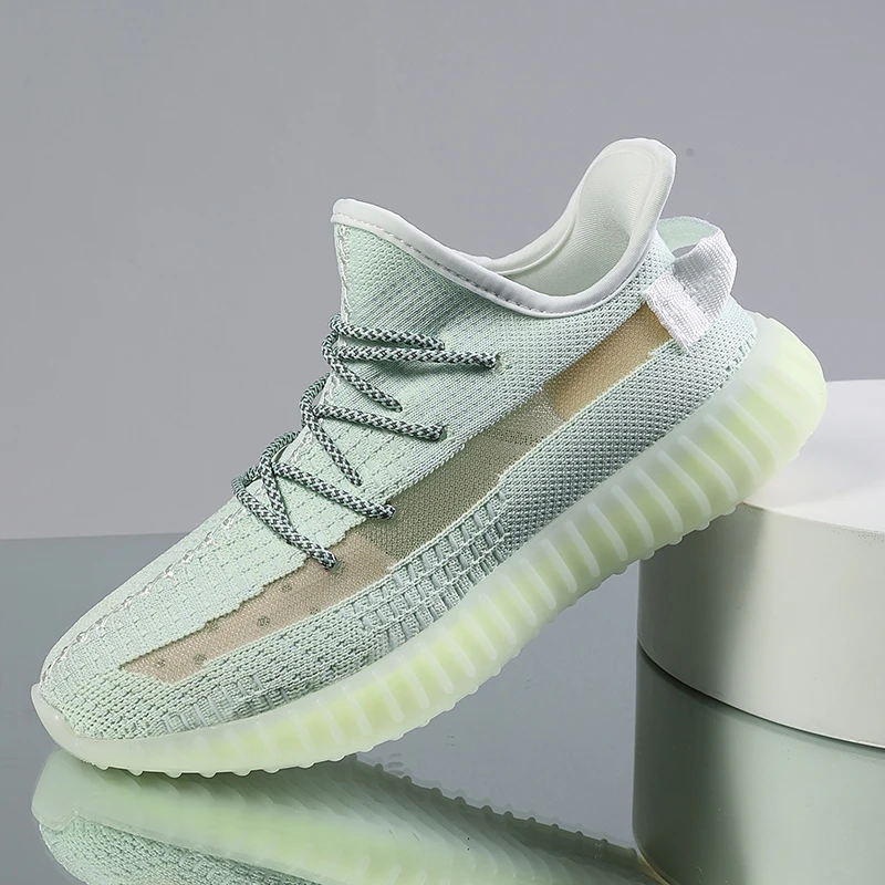 2021 de gran tamaño de los zapatos de los hombres de los zapatos de primavera nuevos volando tejido casual de moda Zapatos Deportivos zapatos para correr