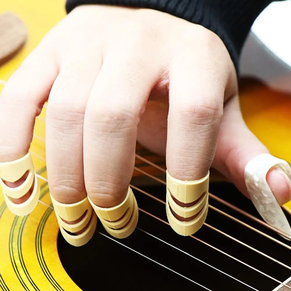 

Dragonpad 4 Pcs/set Finger Picks Sleeve for Acoustic Electric Guitar Stringed Instrument (3PCS Forefinger +1PC Thumb)