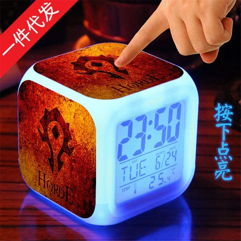 

World of warcraft noctilucent alarm clock and colorful flash touch light moving accidentally toys to children for Christmas