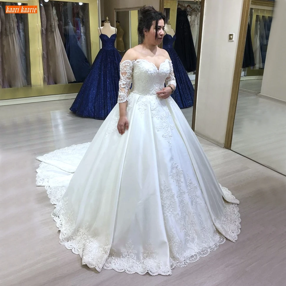 

Sexy Off Shoulder White Wedding Gowns Satin Trouwjurk Lace Up Appliqued Ball Gown Bride Dresses Long Sleeves 2020 Suknia Slubna