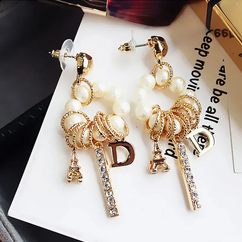 

New Fashion silver Multi-element Eiffel Tower L Pendant Tassel Earrings Wild Long Pendientes For Women jewelry