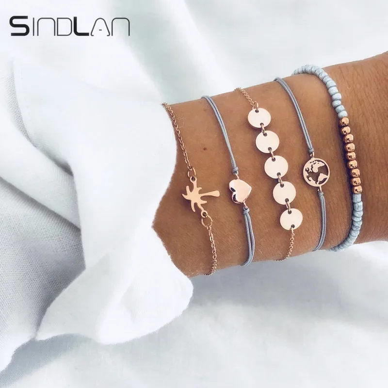 

Sindlan 5PCs Simple Fashion Gold Charm Bracelets for Women Coconut Tree Map Heart Boho Bangles Bracelets Set Wrist Chain Jewelry