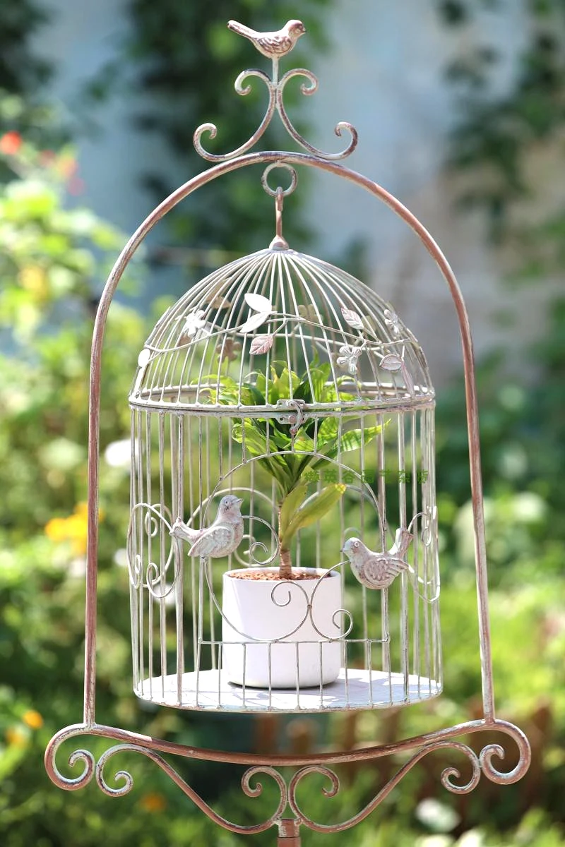 Lot - Victorian brass bird cage on stand