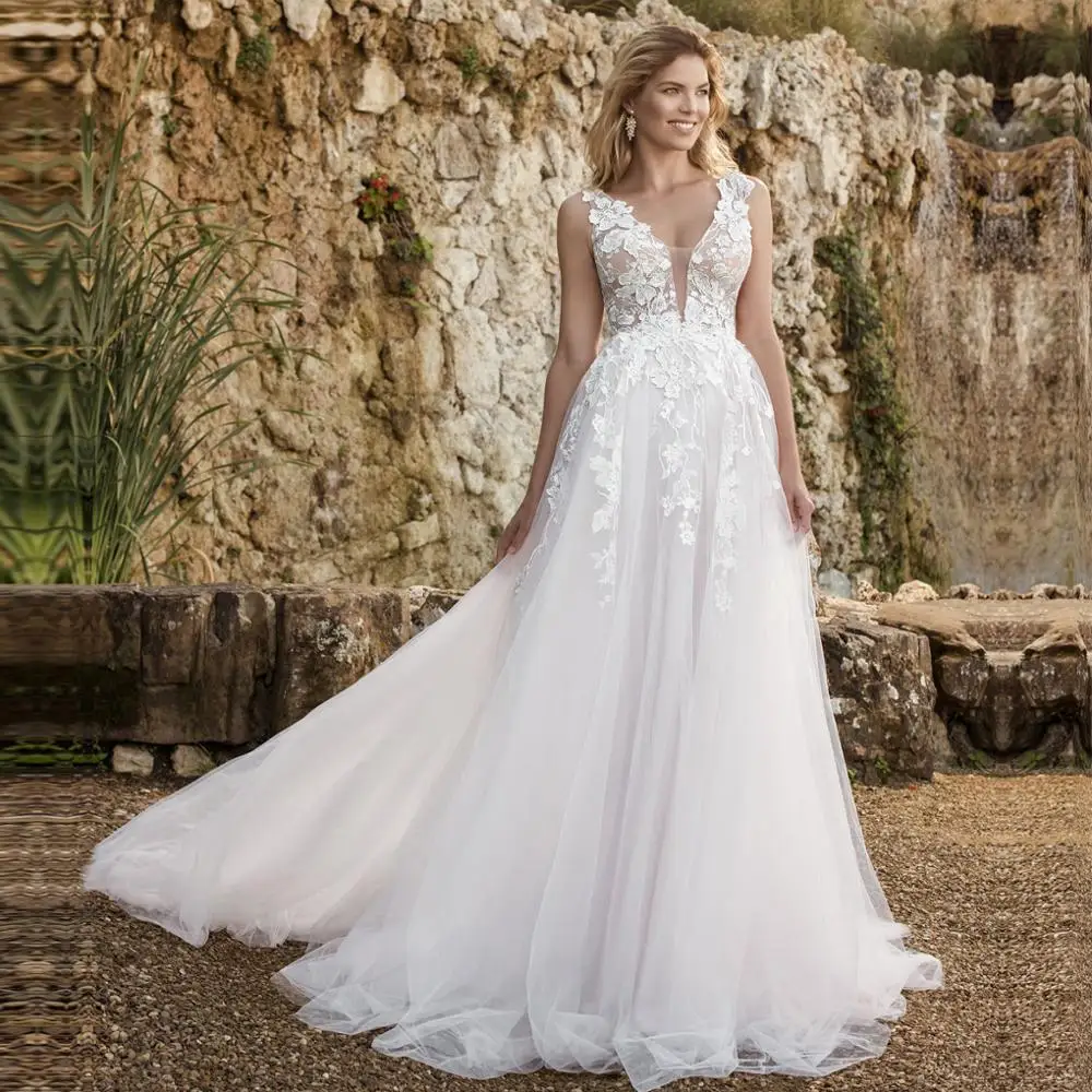 V Neck Wedding Dresses 2020 Floor Length Applique Back Button Sleeveless A Line Backless Tulle Bridal Dress Vestido De Noiva V Neck Wedding Dresses 2020 Floor Length Applique Back Button Sleeveless A Line Backless Tulle Bridal Dress Vestido De Noiva