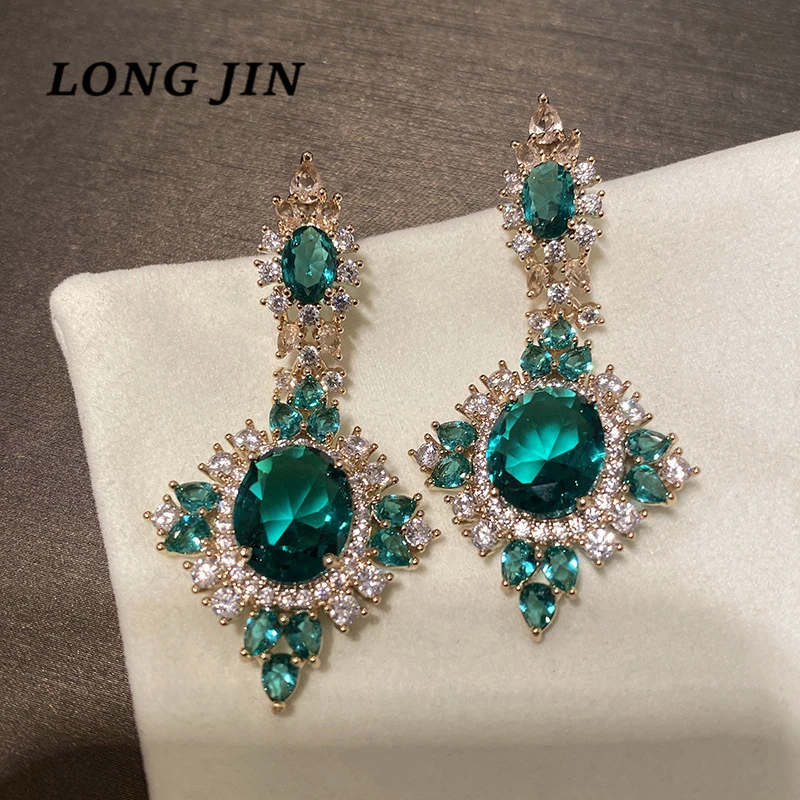 

Exaggerated Micro-Inlaid Green Zircon Golden Ladies Earring Luxury Temperament Creative Wild Holiday Best birthday gift kolczyki
