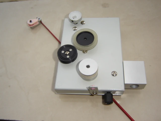 

Magnetic damping tension device for winding machine