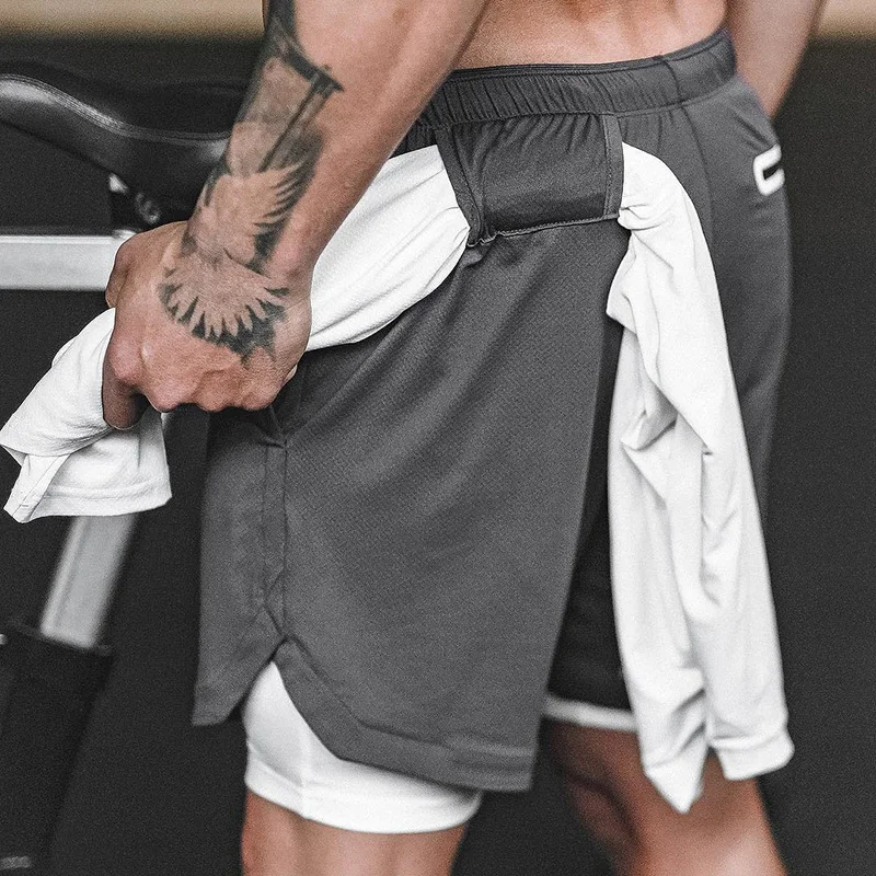 Горячие мужские спортивные шорты быстросохнущие со встроенным карманом подкладка для лета бега hh88