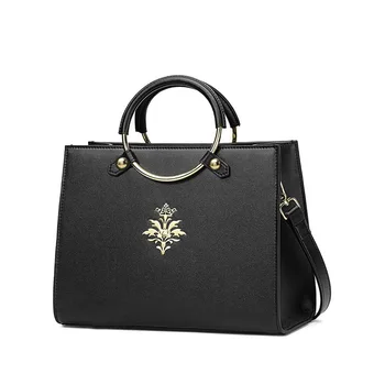 

Genuine leather fashion ring hardware wrist handbag for women