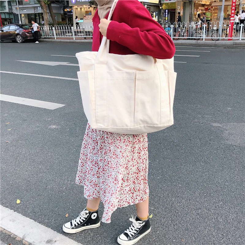 

Korean Ins Lazy Wind Multi-pocket Canvas Bag Large-capacity Shoulder Shopper Tote Bag Wholesale Female Students Shopping Bags