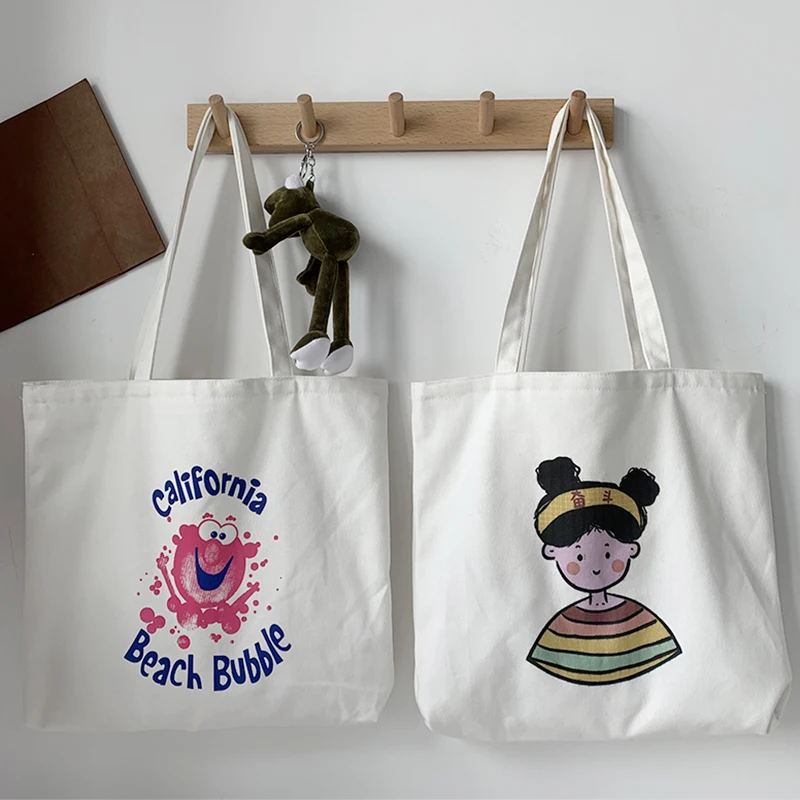 Large capacity canvas bag female shoulder Japanese and Korean students  ladies bag double-sided pattern light women's handbag